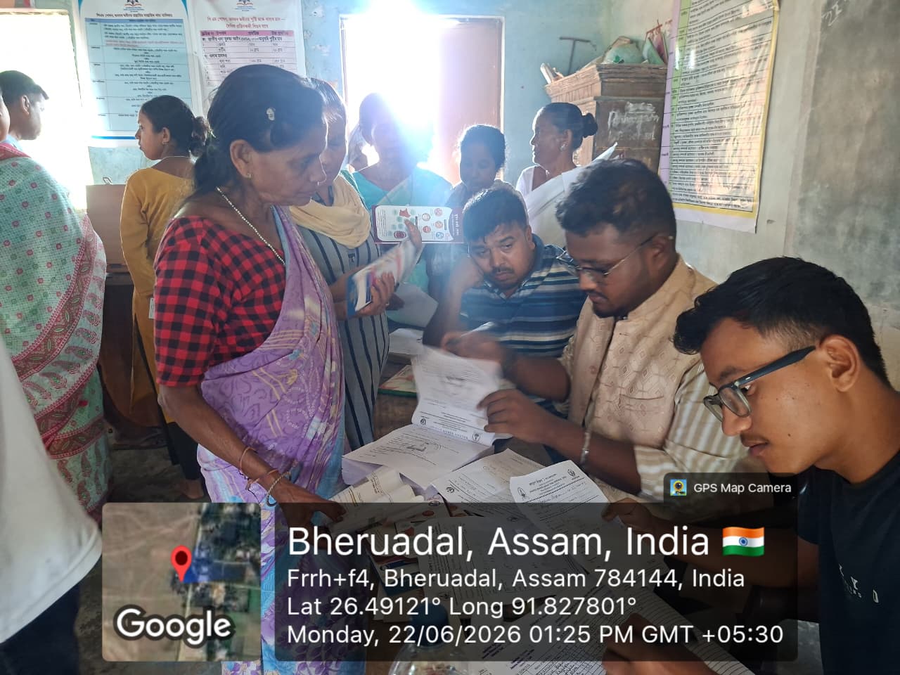 Women registering at the health camp desk